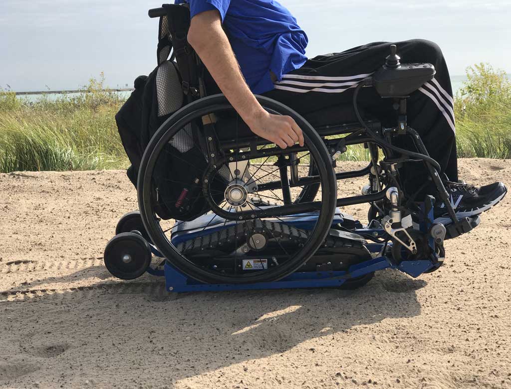 Location- de chenillette pour fauteuil roulant manuel